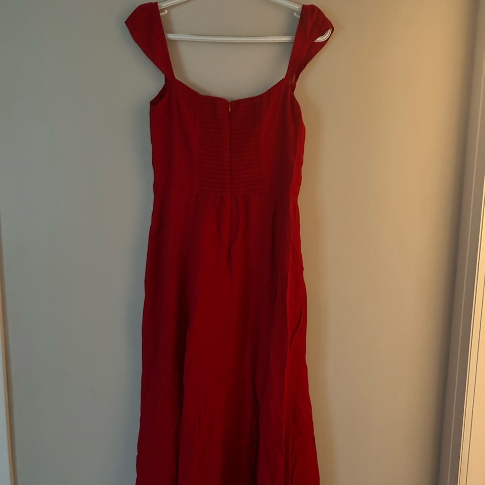 Beautiful red reformation dress. Wore it once. No pets no smoke house.  Like new